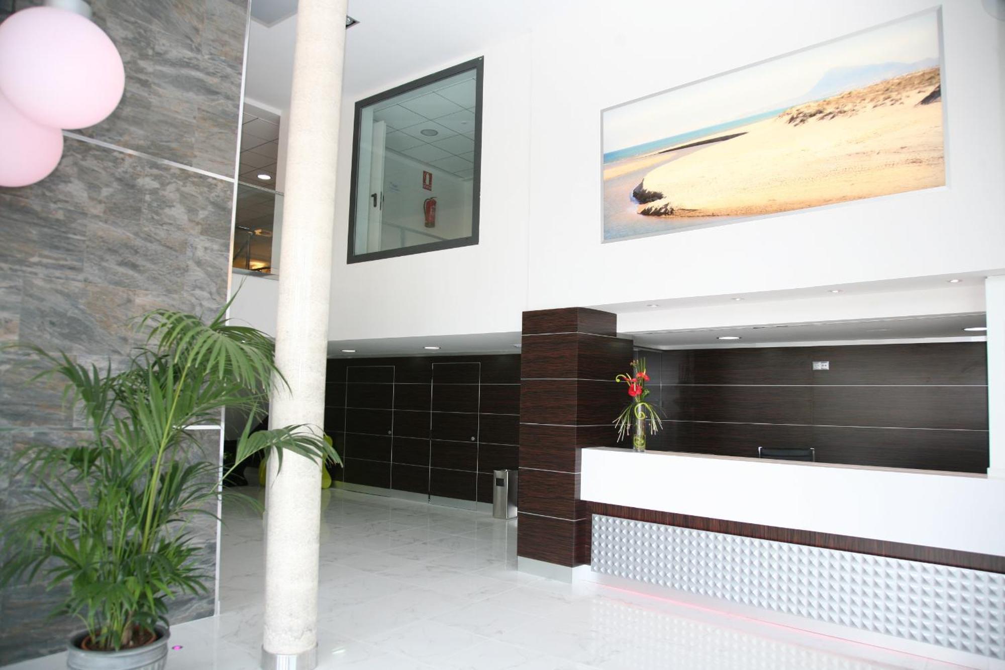 Aparthotel Playa Oliva Buitenkant foto